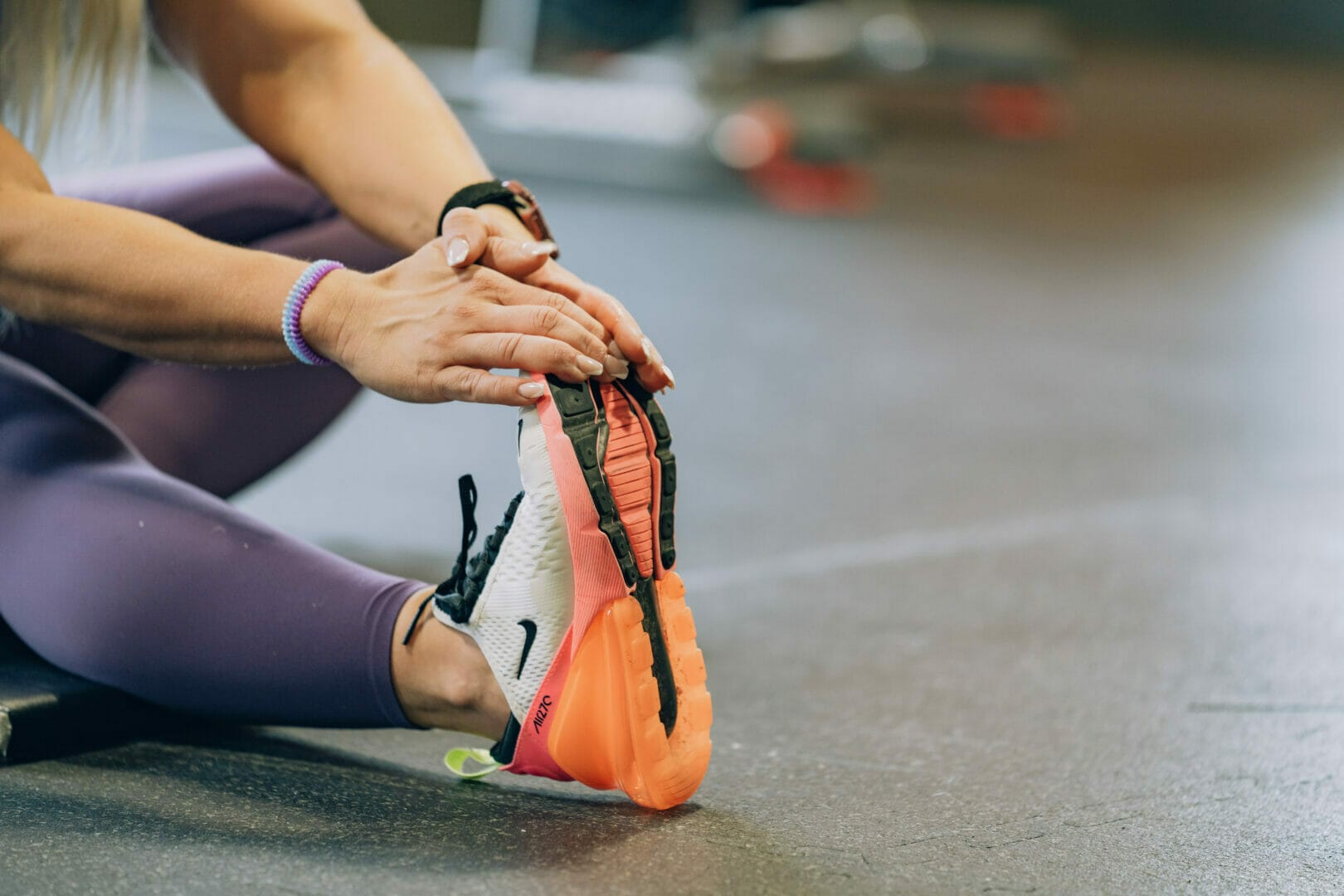 Woman stretching on the floor