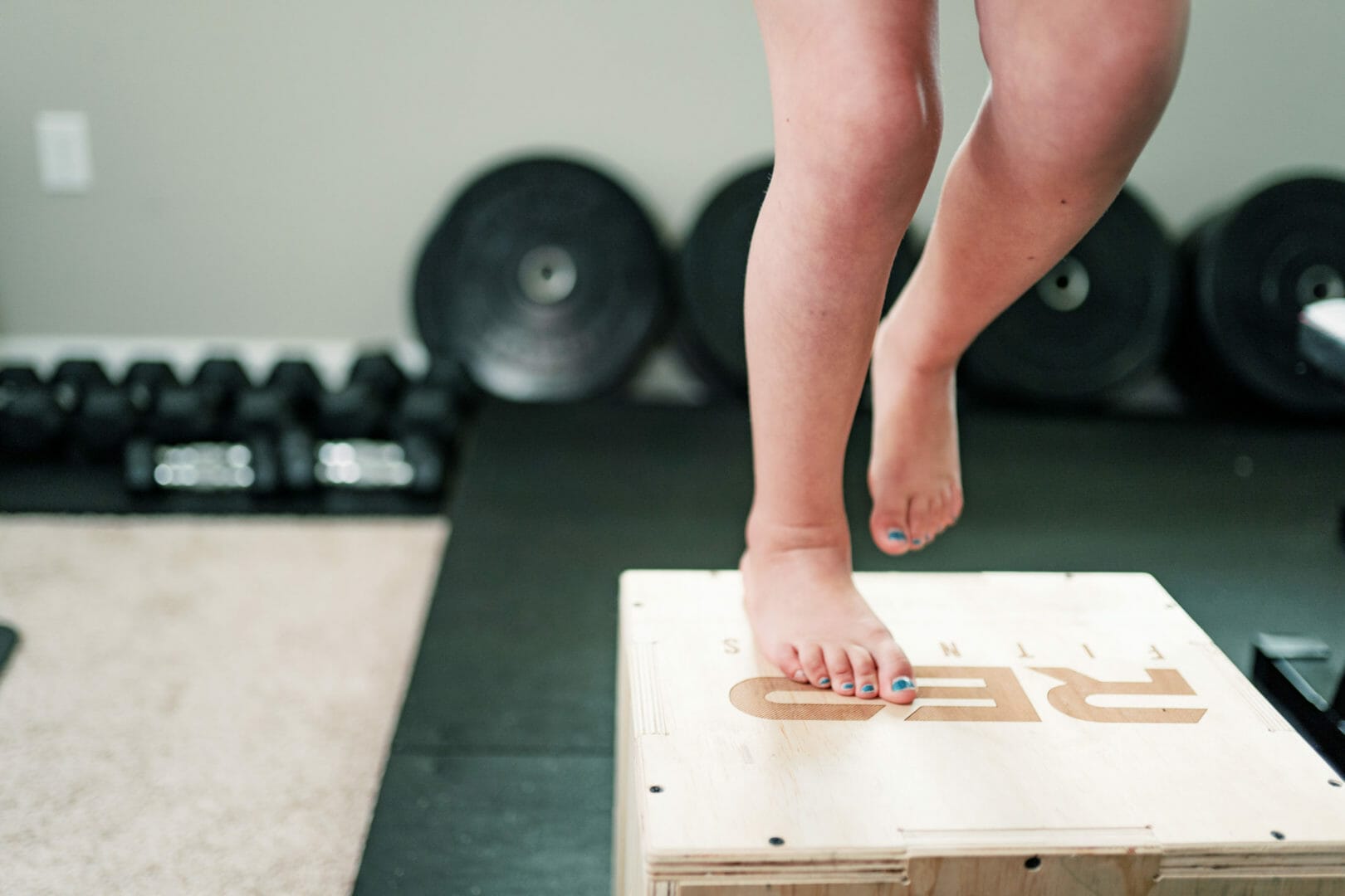 Kid standing on a box at Tony Cress Training Center
